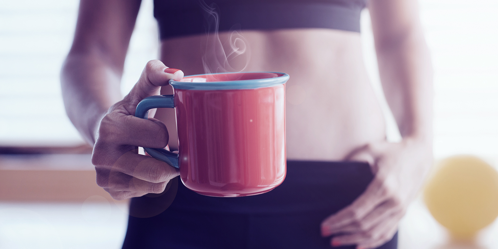 fit woman with coffee mug