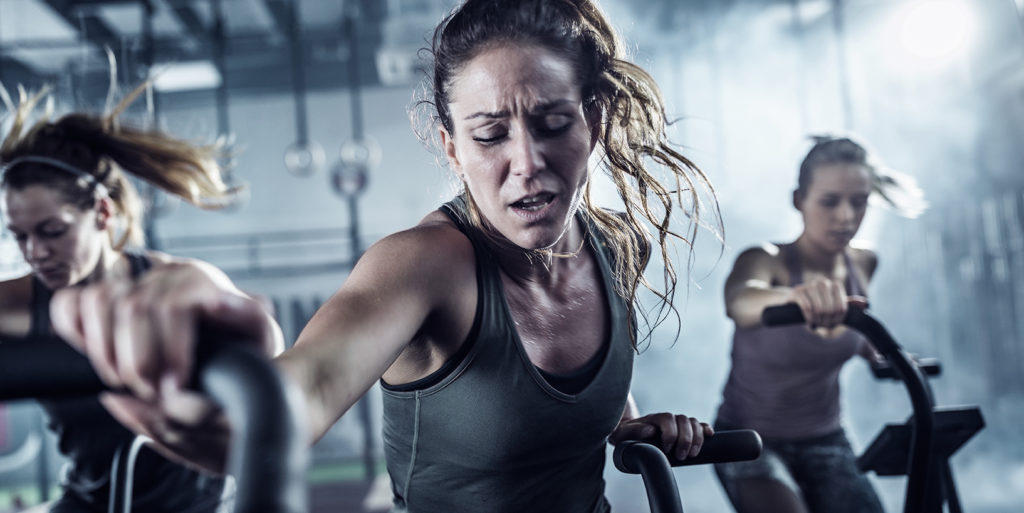 woman sweating while working out